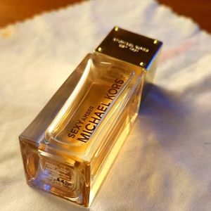 Sold.  Michael Kors Sexy Amber EAU DE PARFUM Mini